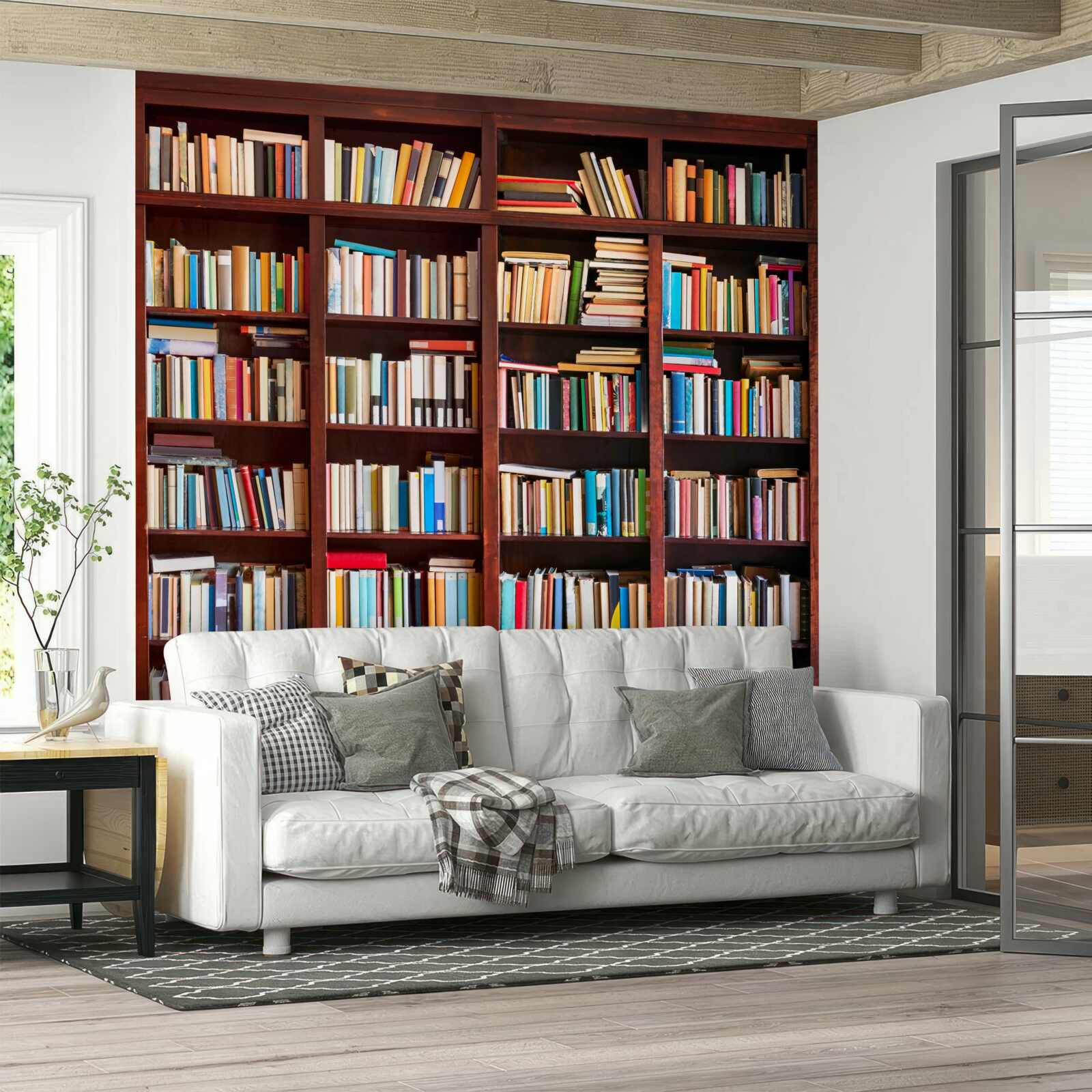 Papier peint des rangées de livres de différentes couleurs sur les étagères