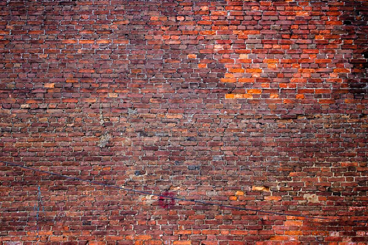 Papier peint vieux mur de briques rouges