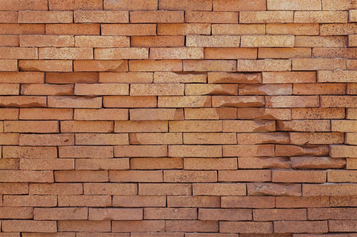 Papier peint relief en briques d'argile rouge