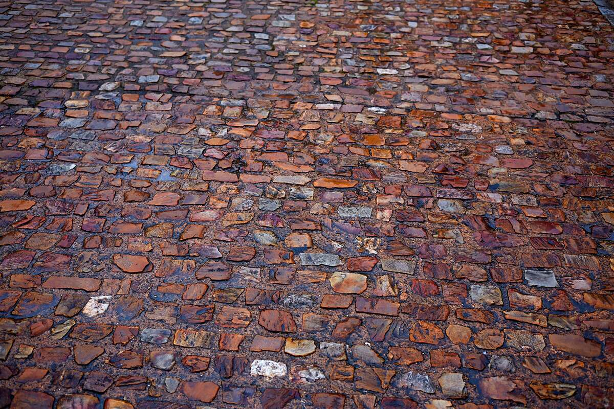 Papier peint rue ancienne pavée de galets