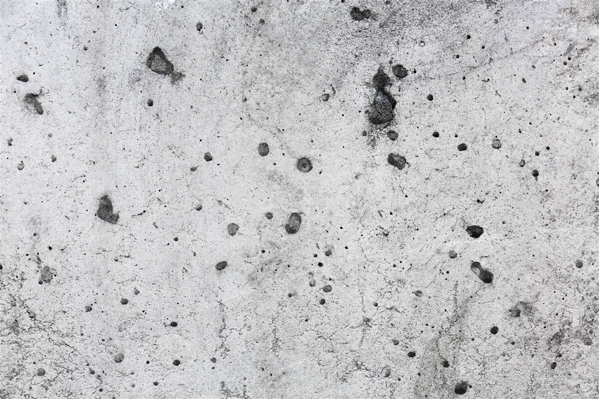 Papier peint mur en béton avec des marques sombres
