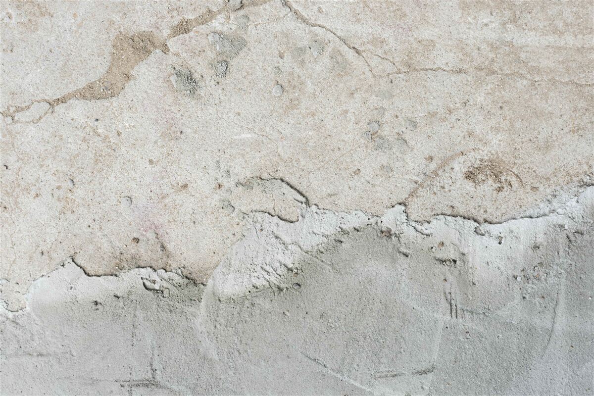 Papier peint mur en béton avec défauts
