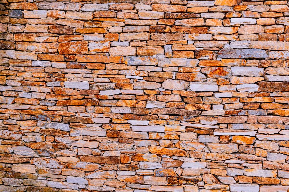 Papier peint clôture longitudinale en pierre brune