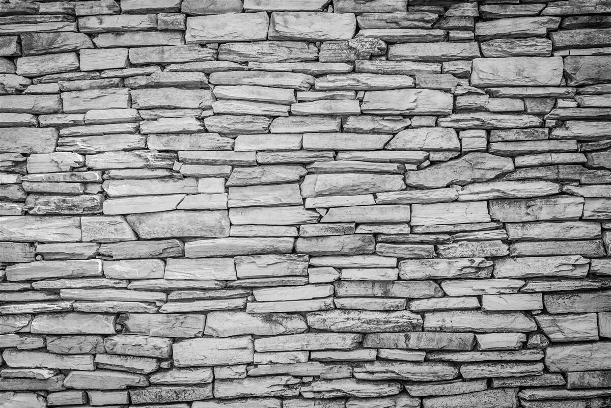 Papier peint structure de mur en pierre grise