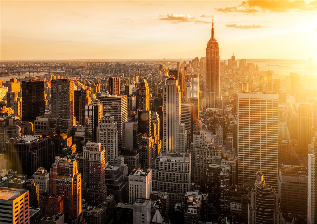 Papier peint gratte-ciel de new york dans la lumière du soleil couchant