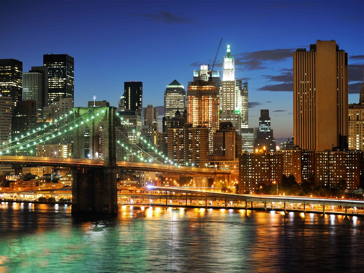 Papier peint panorama de new york la nuit depuis la rive opposée