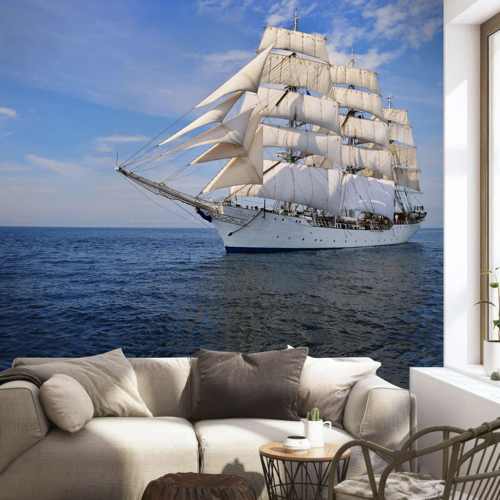Papier peint un navire à voiles sur une mer calme