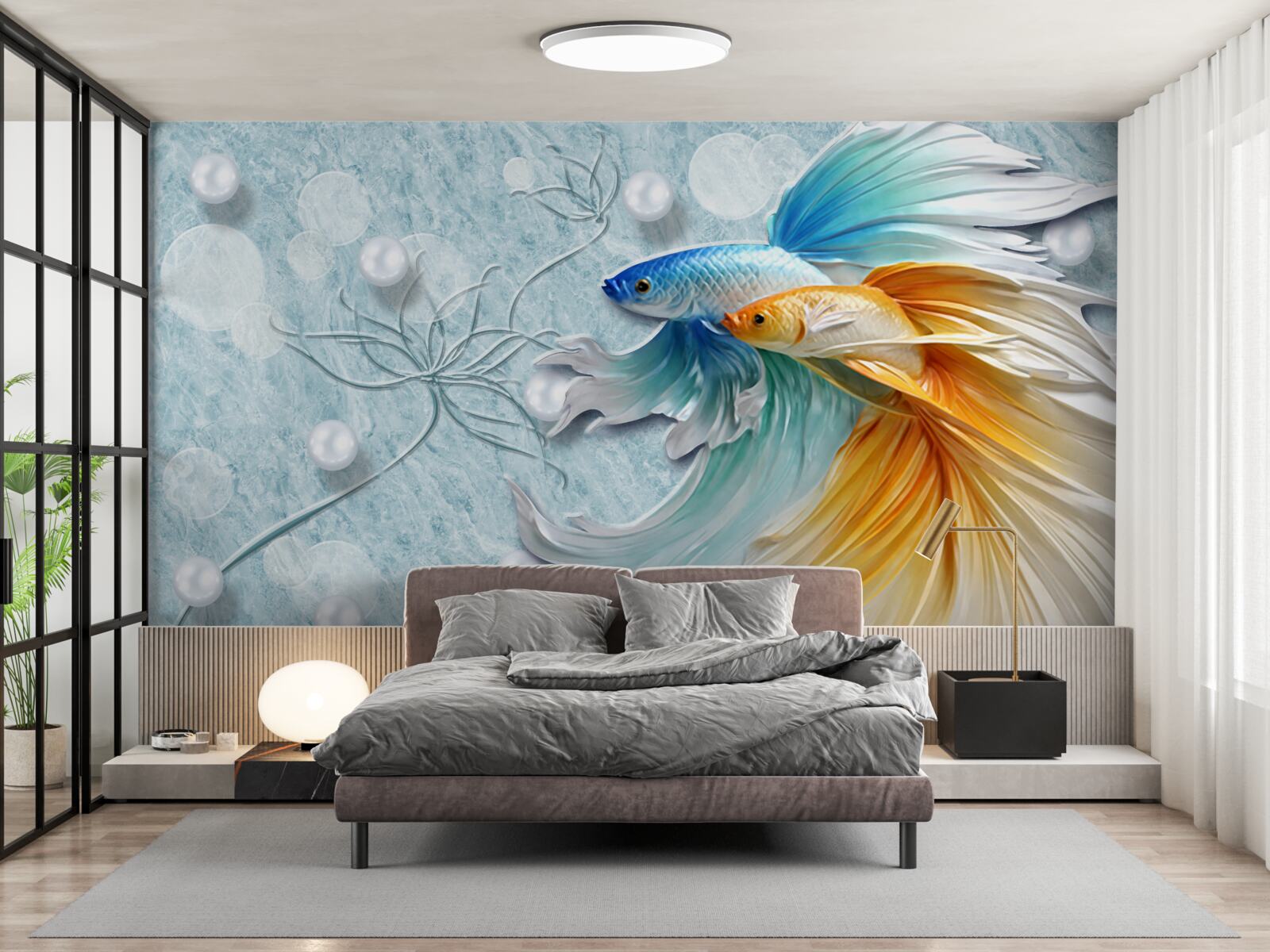 Papier peint des poissons à la queue luxueuse, enveloppés d'or et de bleu