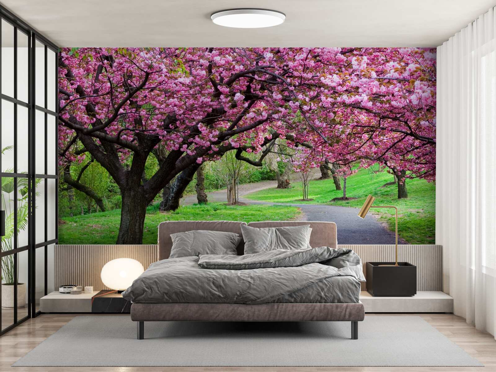 Papier peint une allée du parc parsemée de fleurs