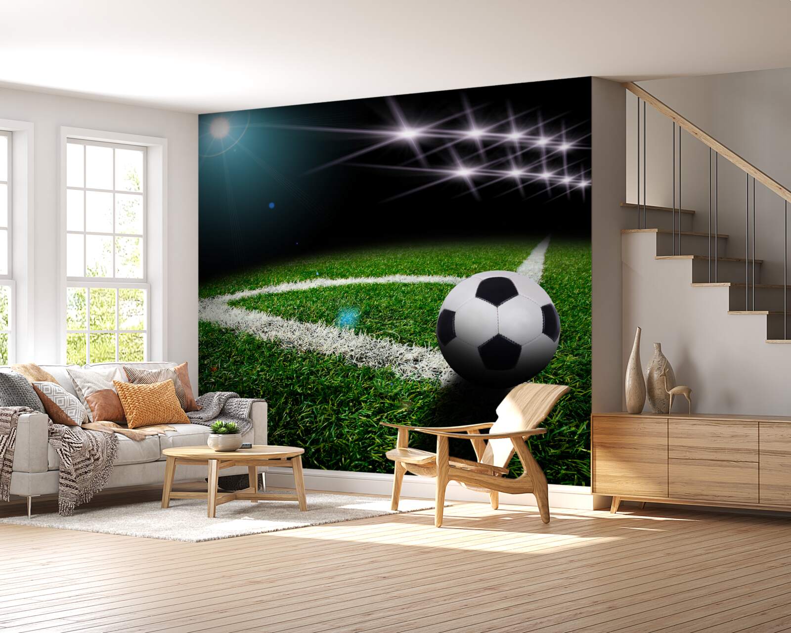 Papier peint le ballon repose sur la pelouse du stade
