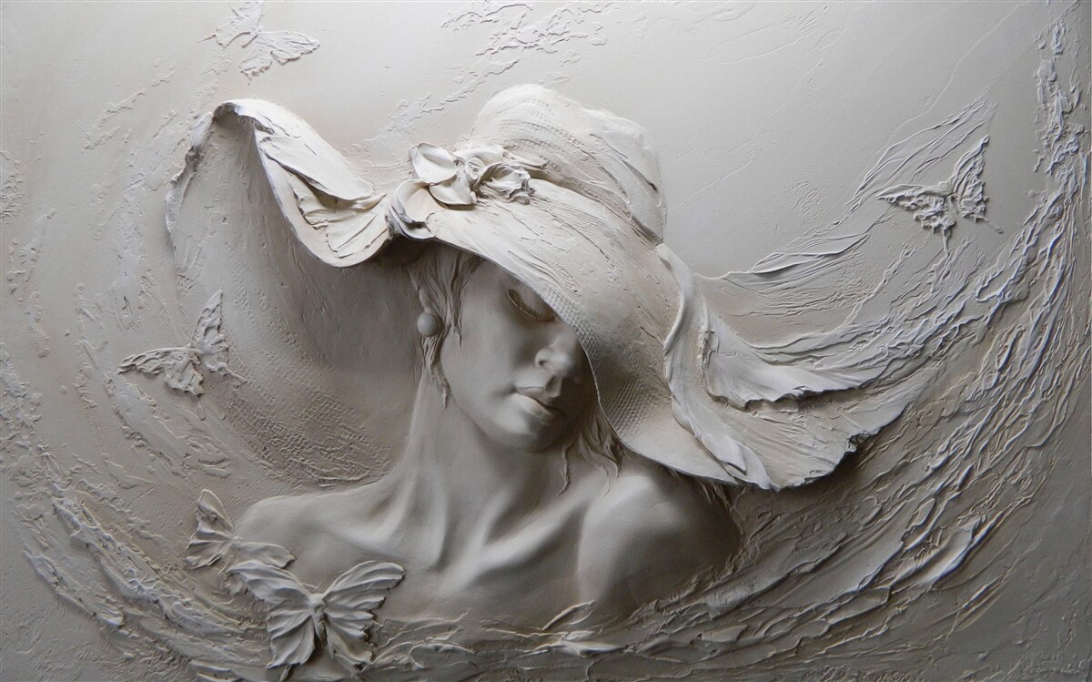 Papier peint femme avec coiffe, bas-relief