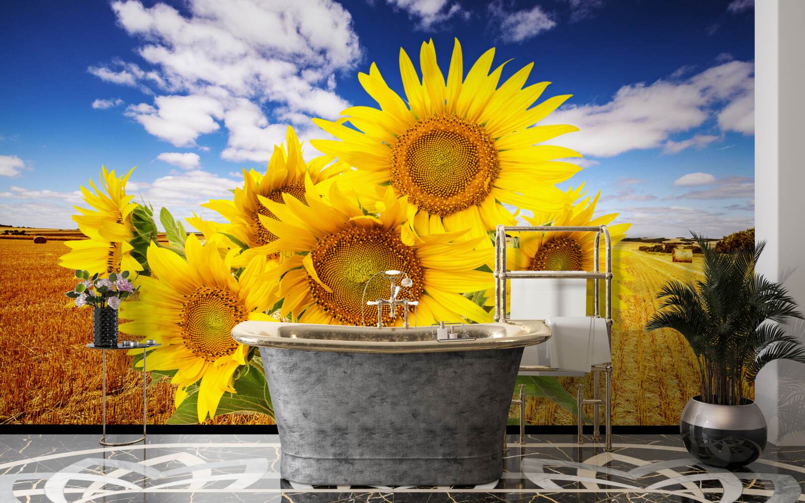 Papier peint un bouquet de tournesols se détache sur le ciel et un champ de blé