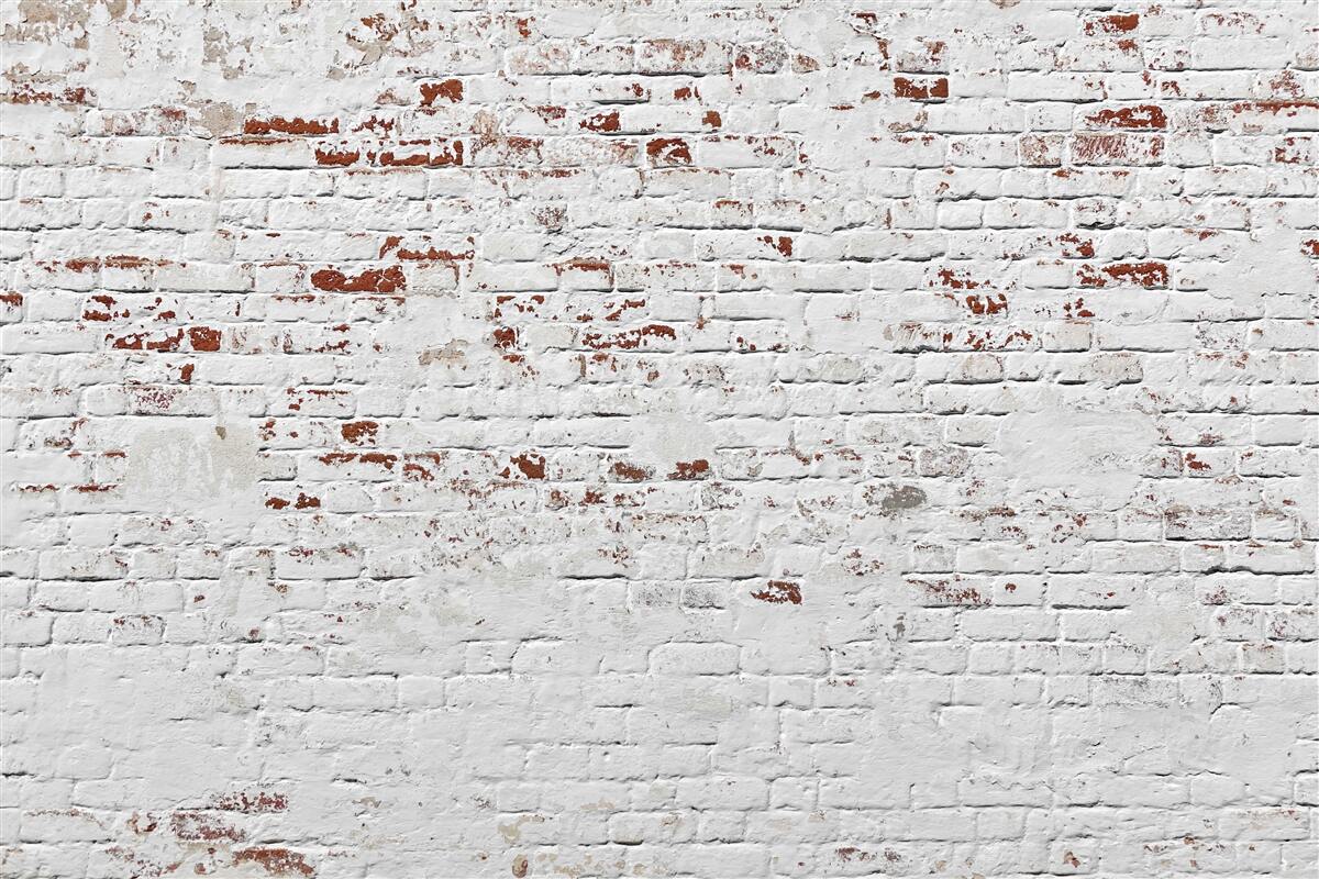 Papier peint Un mur de briques qui a perdu son aspect