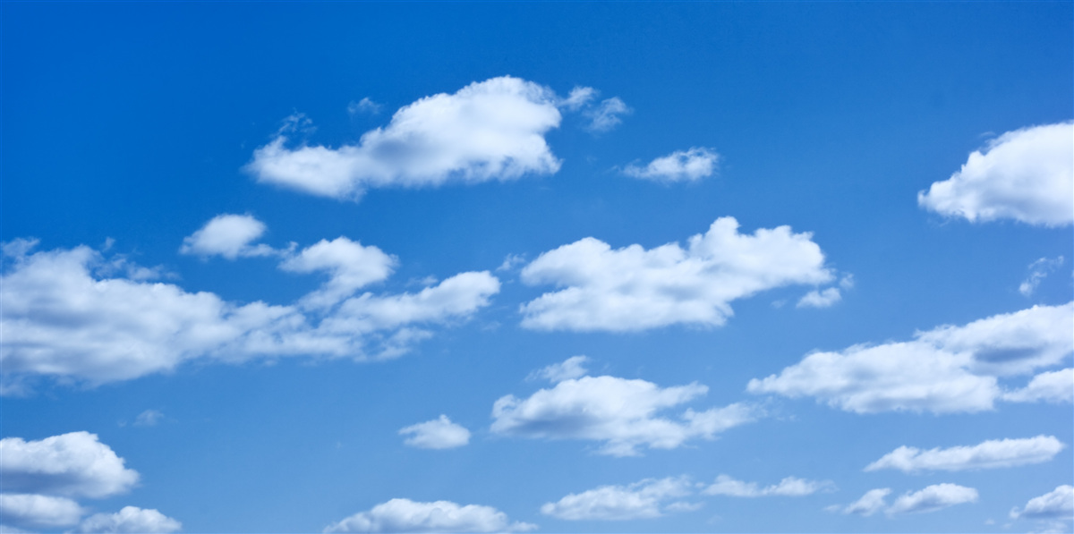 Papier peint nuages blancs flottant dans un ciel bleu