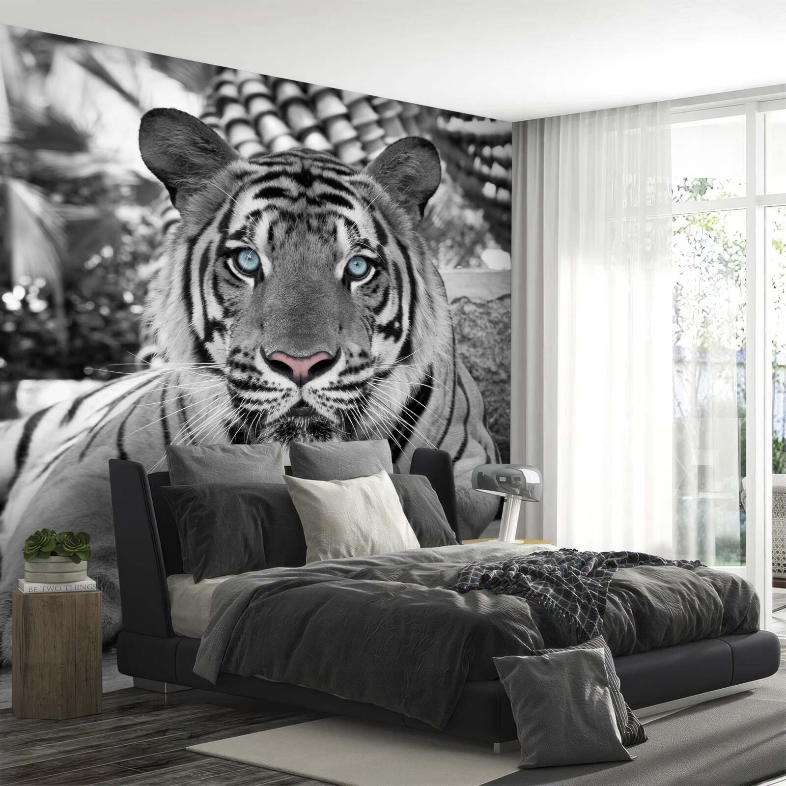 Papier peint tigre noir et blanc aux beaux yeux bleus