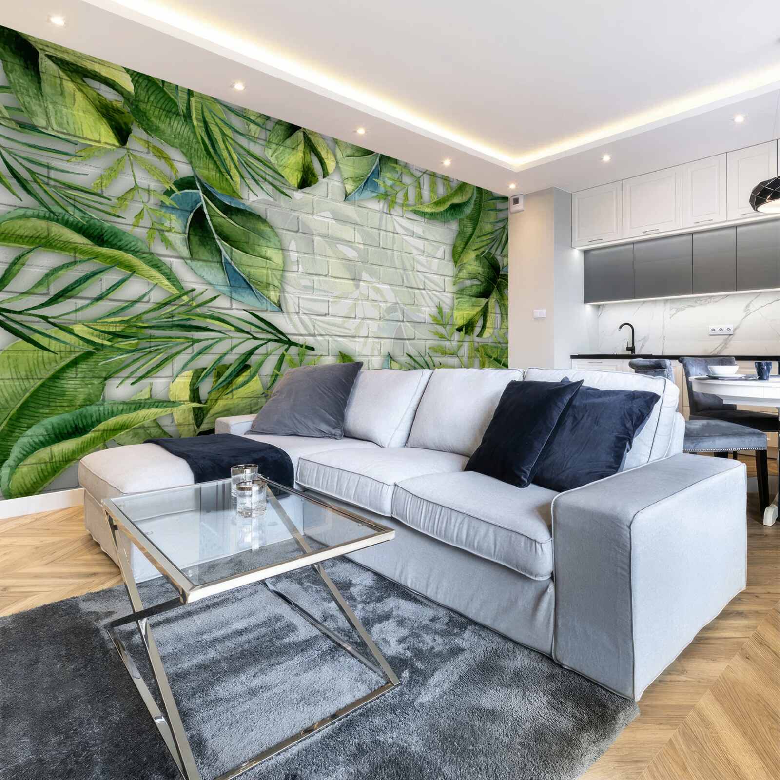 Papier peint vert tropical sur un mur de briques