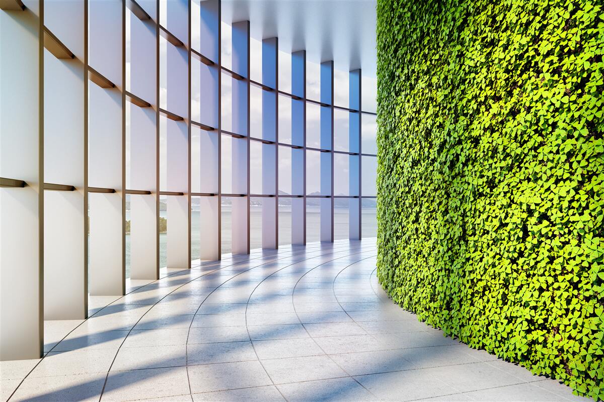 Papier peint immeuble de bureaux avec mur végétal