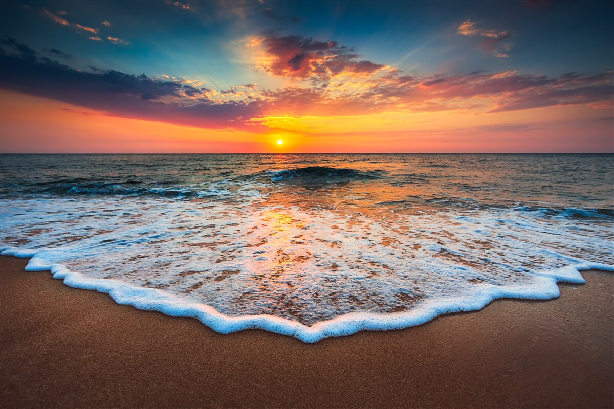 Papier peint coucher de soleil sur l'océan