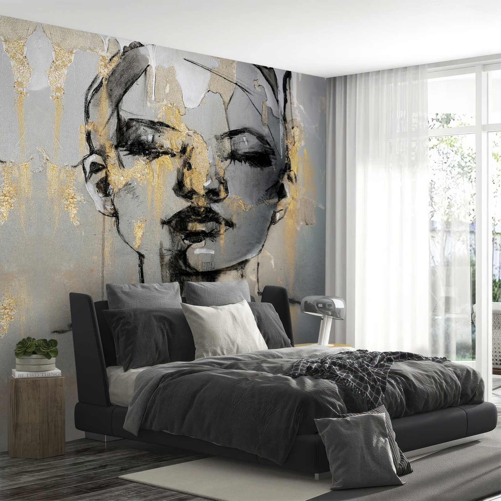 Papier peint une fille dessine une abstraction avec de la peinture noire