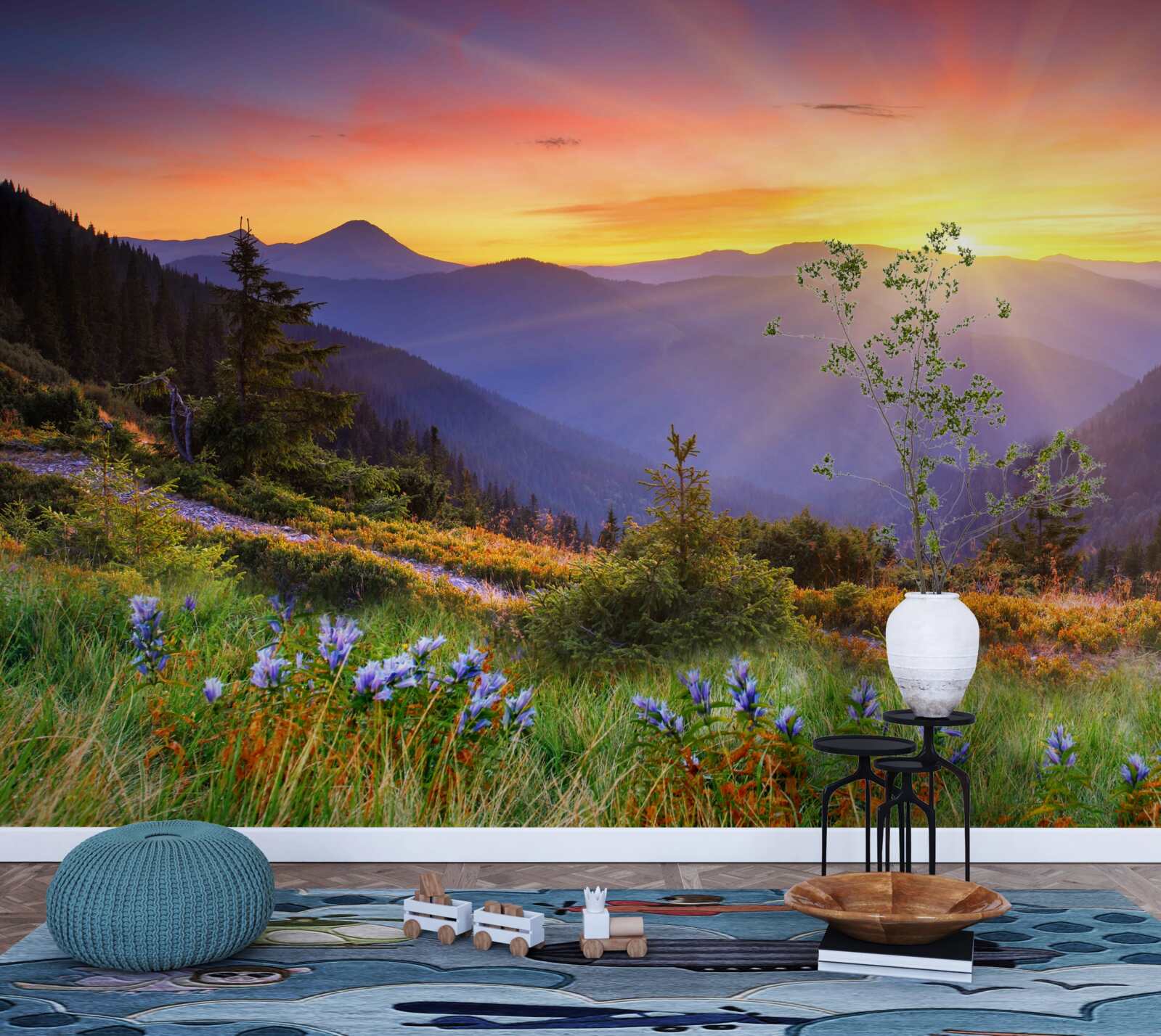 Papier peint le soleil se couche sur une prairie alpine