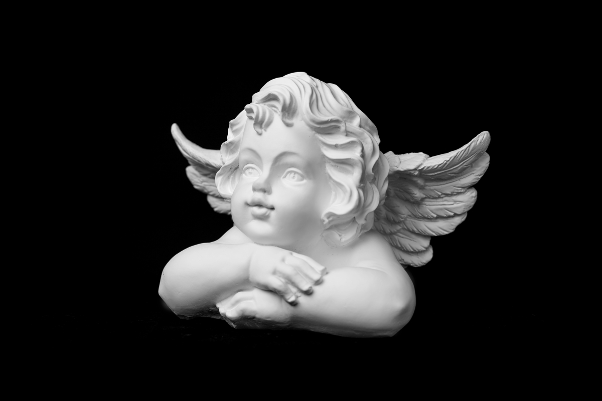 Papier peint ange sculpté dans la pierre