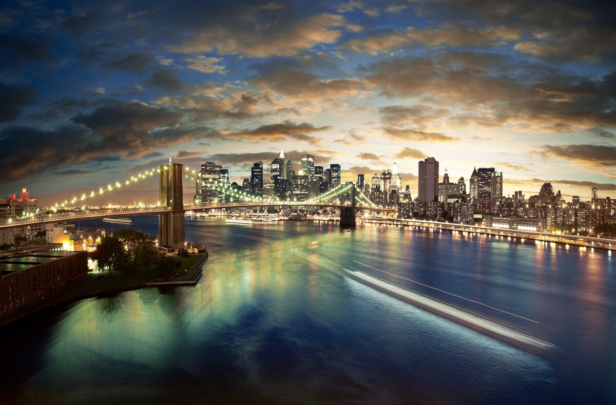 Papier peint illumination nocturne de new york au bord de l'eau