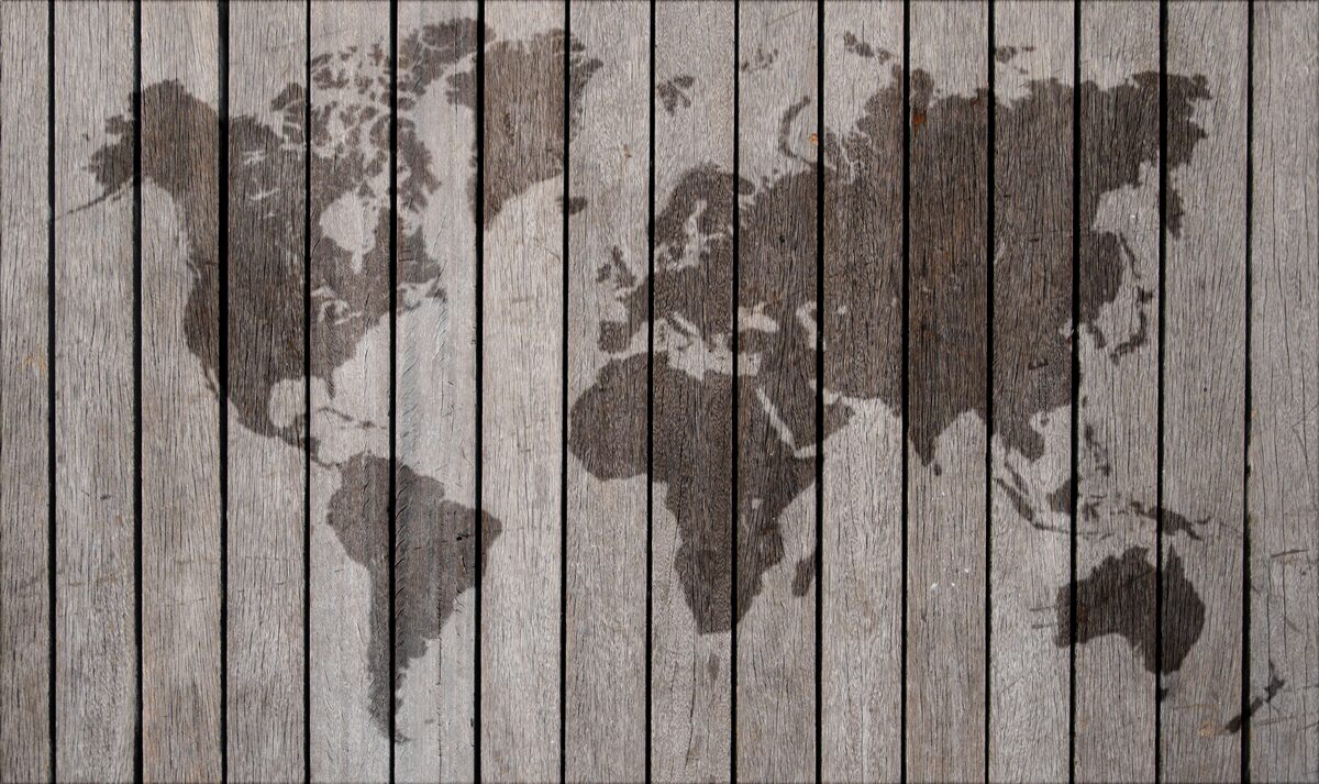 Papier peint image du monde sur un parquet en bois