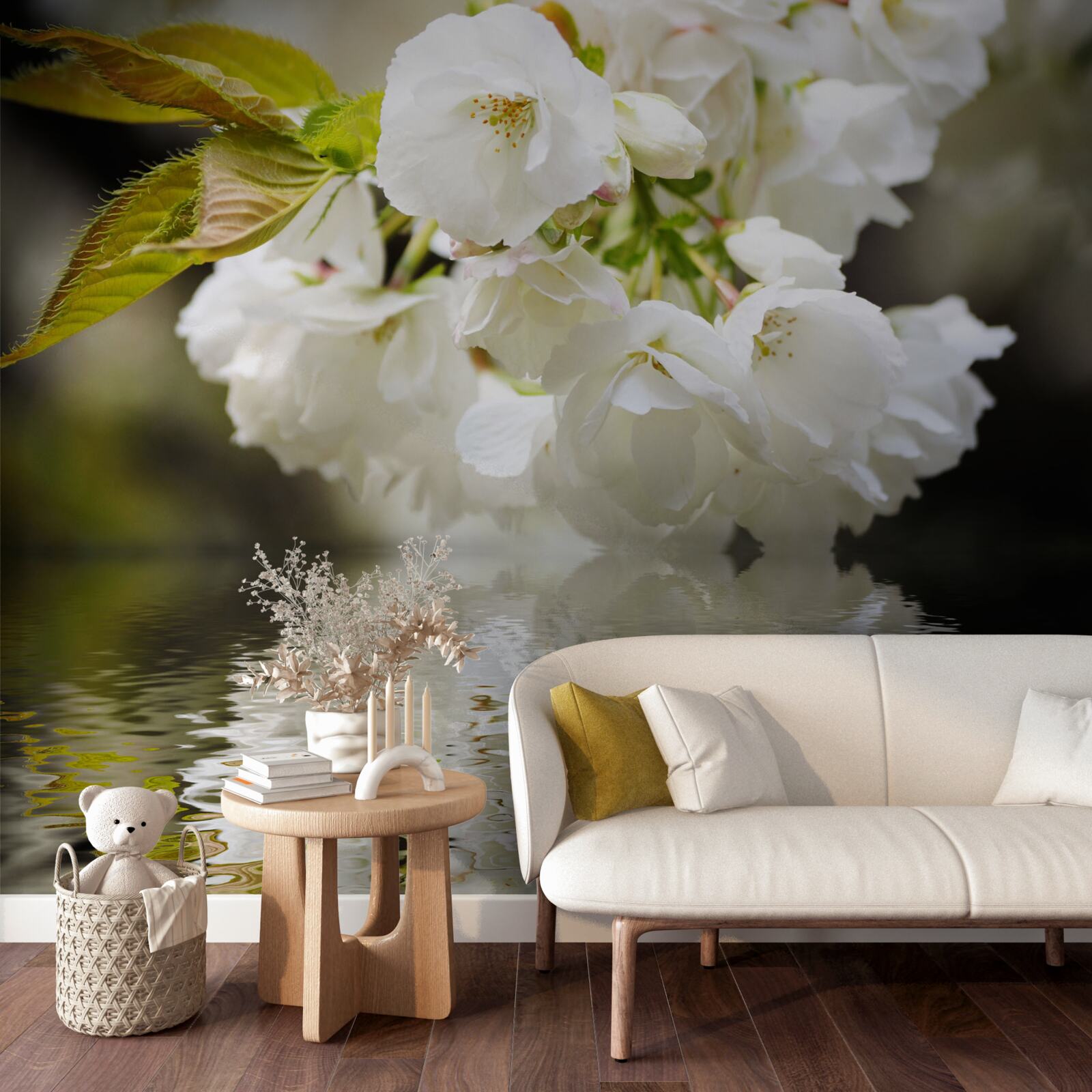 Papier peint des fleurs de sakura dans des tons blancs se penchent sur la surface de l'eau