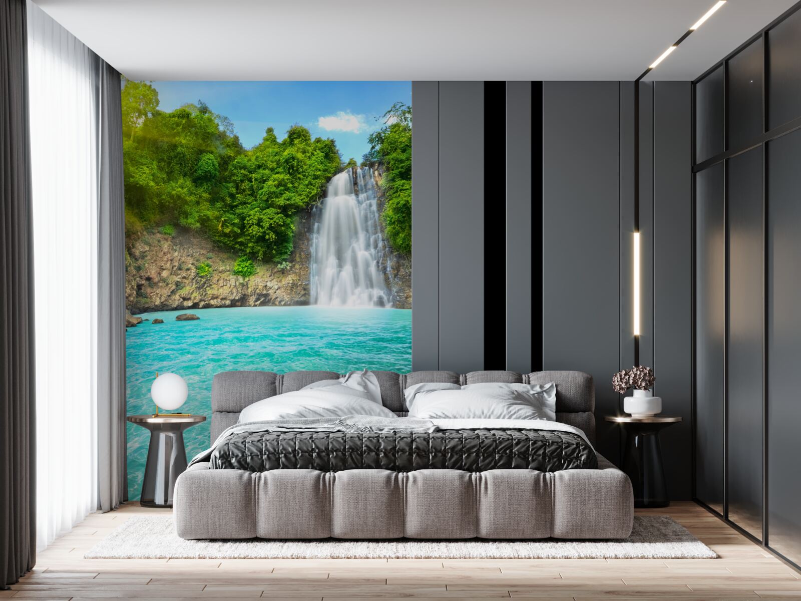 Papier peint une gracieuse cascade se jette dans un lac bleu