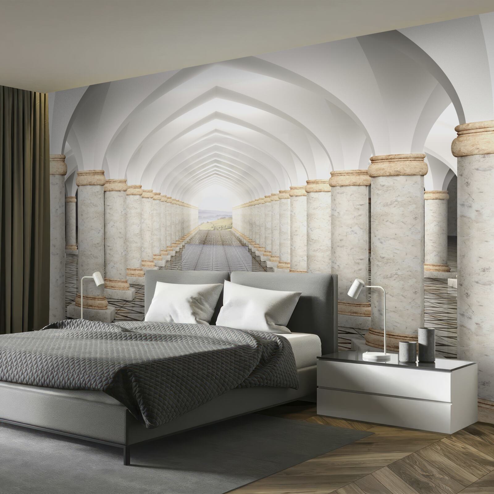 Papier peint un tunnel sans fin parsemé de colonnes
