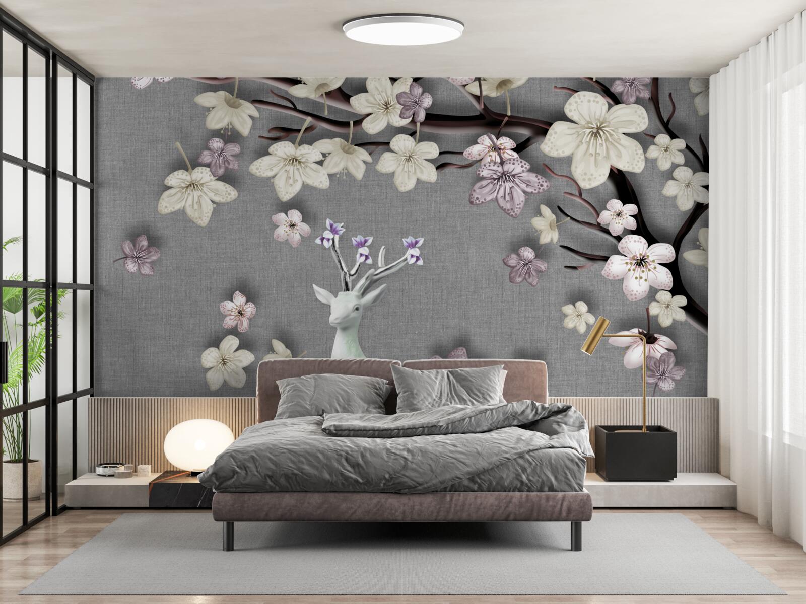 Papier peint des branches de magnolias en fleurs et un cerf blanc